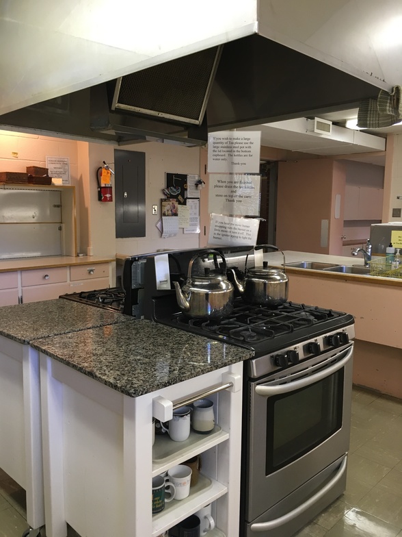 Kitchen - stoves and large range hood